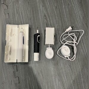 2 Oral-B Electric Toothbrushes with Chargers